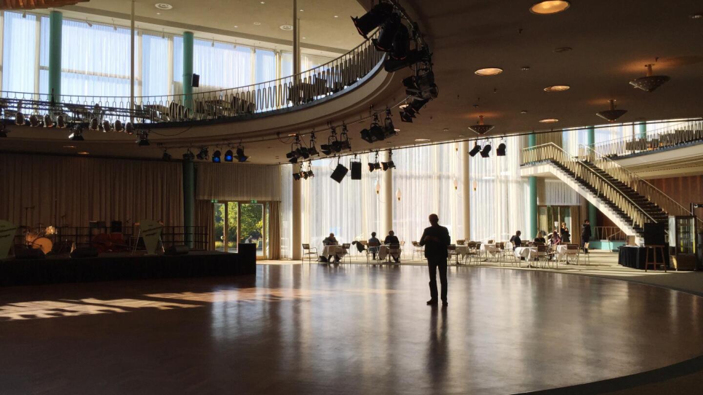 Shows a big Event Location with lights pointing at stage